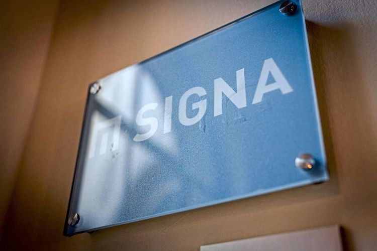 Ein blaues Firmenschild von Signa