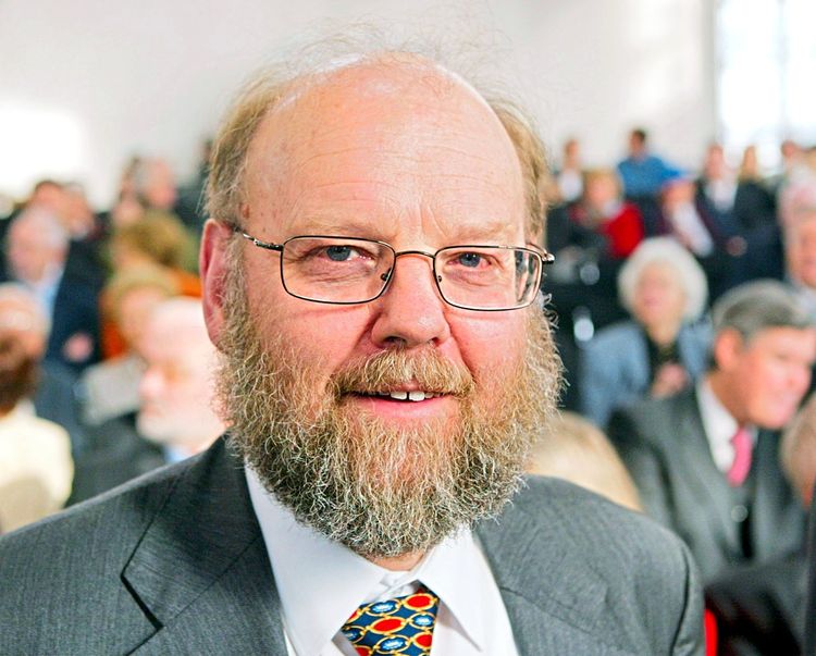 der britische Forscher Ian Wilmut, ein Mann mit Brille und weiß-blondem Vollbart