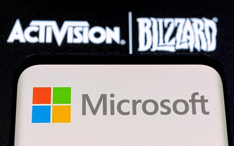 Logos von Microsoft und Activision Blizzard