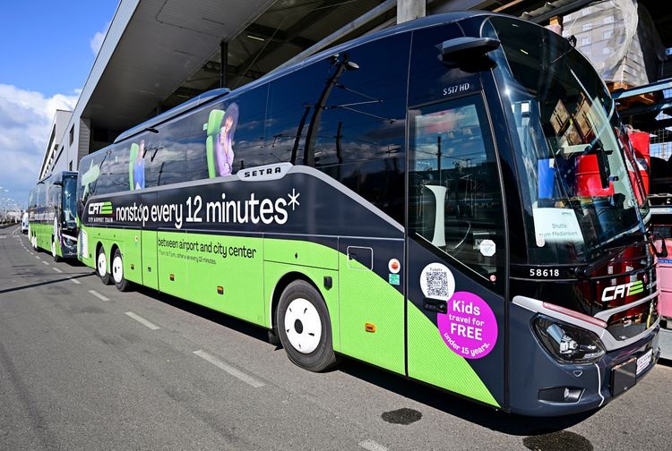 A green and black Setra coach bearing the words 