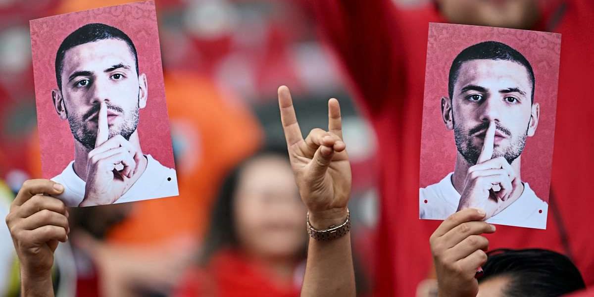 Numerous wolfish greetings cast a pall over Netherlands and Turkey’s quarter-final match in Berlin