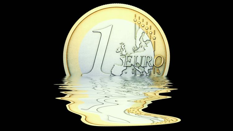 Eine Euromünze, die zerschmilzt