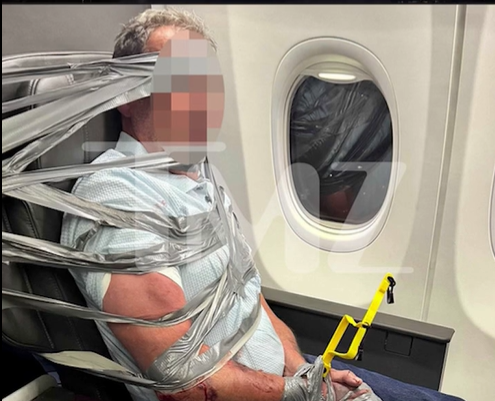 Riotous passenger glued to seat in USA