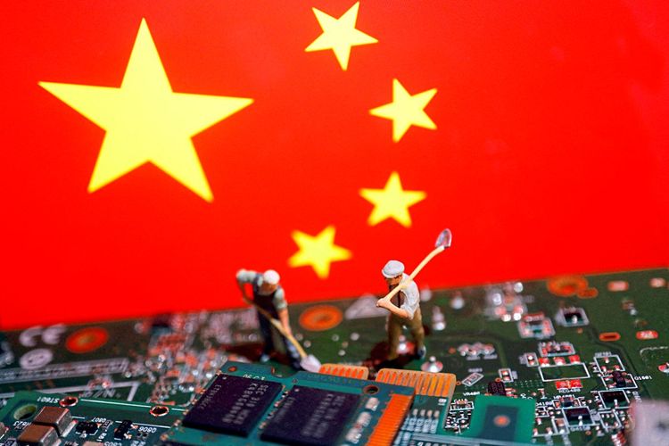 Worker miniatures are placed among the flag of China and printed circuit boards with semiconductor chips, in this illustration picture taken July 5, 2023