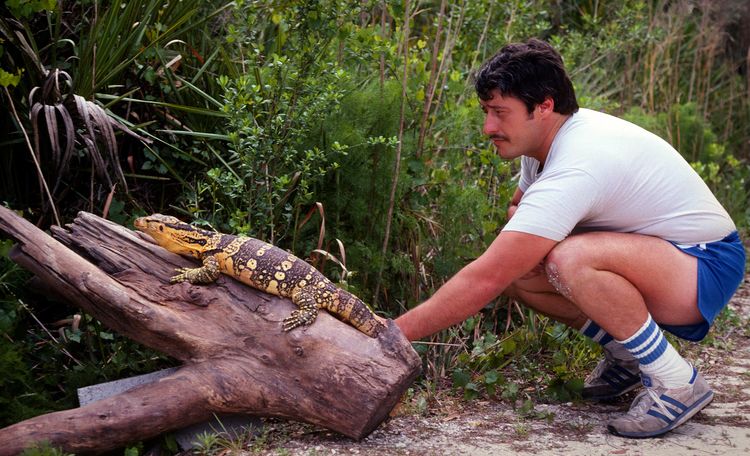 Tommy Crutchfield mit einem Leguan.