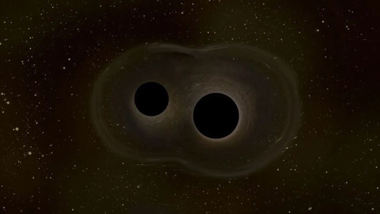 Zwei schwarze Kreise, rund herum etwas Helligkeit, dahjnter wieder schwarzer Hintergrund.