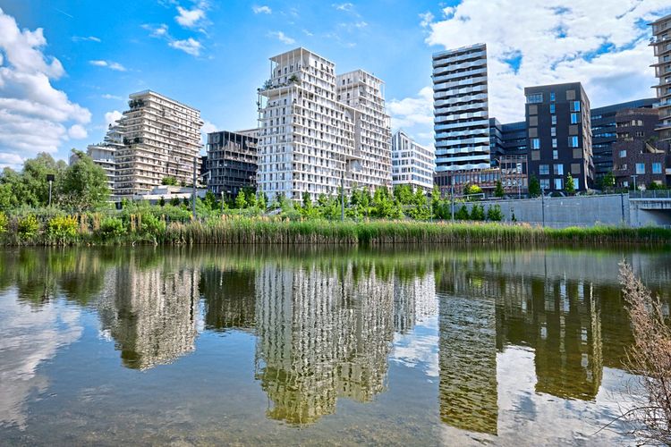 Paris, France Parc Clichy Batignolles Eco District reflectios of New housing projects from Martin Luther King Park