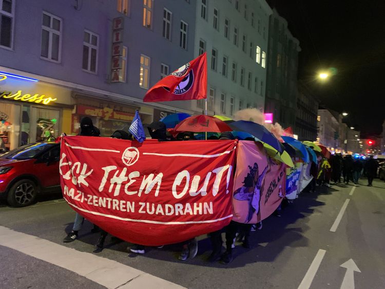 Demonstrators with banner
