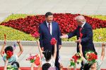 Xi empfängt Trump mit jubelnder Kindergruppe und einer scharfen Warnung